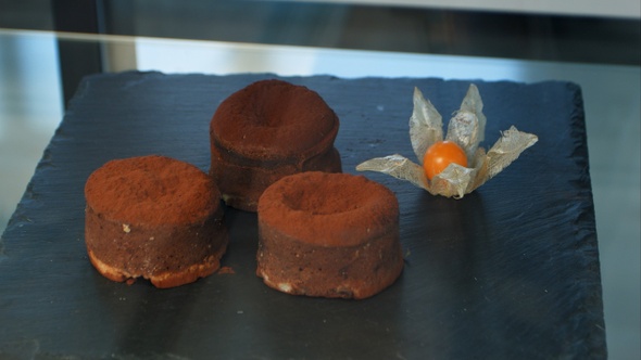 Chocolate Cakes on The Black Display of A Pastry Shop