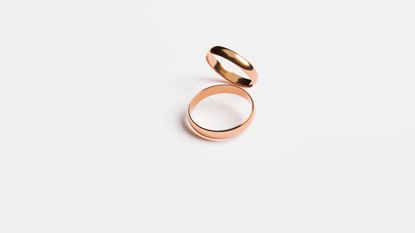 Wedding Golden Rings Isolated on White Background alt