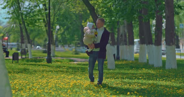Single Father is Spending Time with His Little Daughter in Park in Weekend  Prores