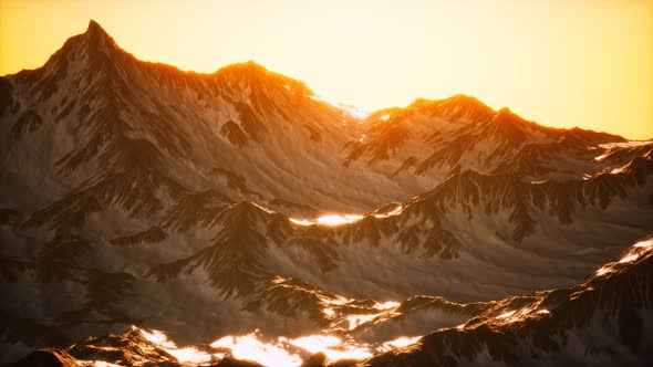 Aerial View of the Alps Mountains in Snow alt