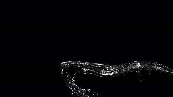 Super Slow Motion Shot of Water Splash at 1000Fps Isolated on Black Background alt