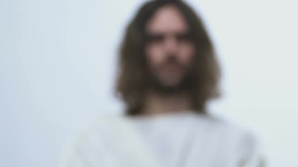 Son of God Reaching Hands With Glass of Holy Water, Healing Religion and Belief alt