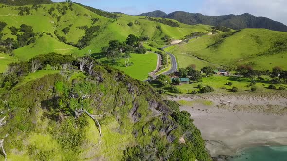 Aerial footage of scenic road on New Zealand coast