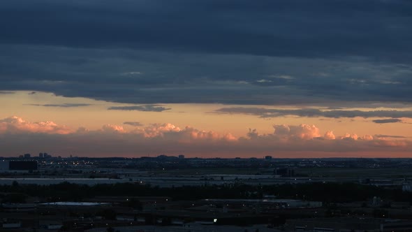 Airport In Toronto At Epic Sunset With Golden Clouds. Wide Angle Timelapse. alt