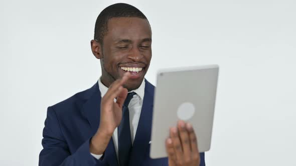 Failure on Tablet By African Businessman, White Background alt