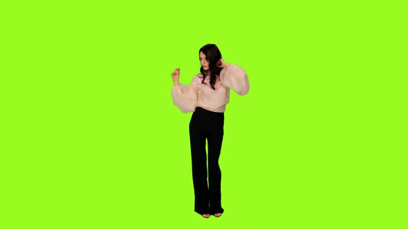 Young Stylish Brunette Girl Singing Song And Dancing