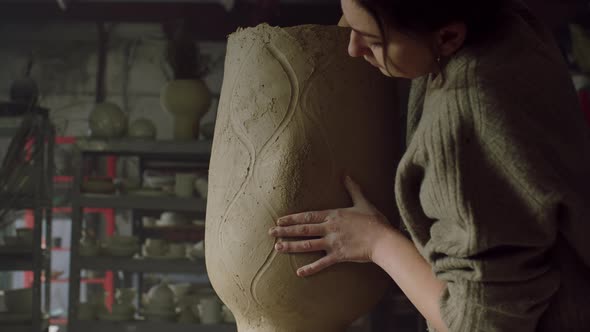 Craftswoman Is Sculpting Beautiful Vase alt
