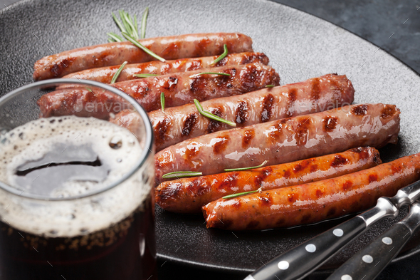 Grilled sausages and beer - Stock Photo - Images