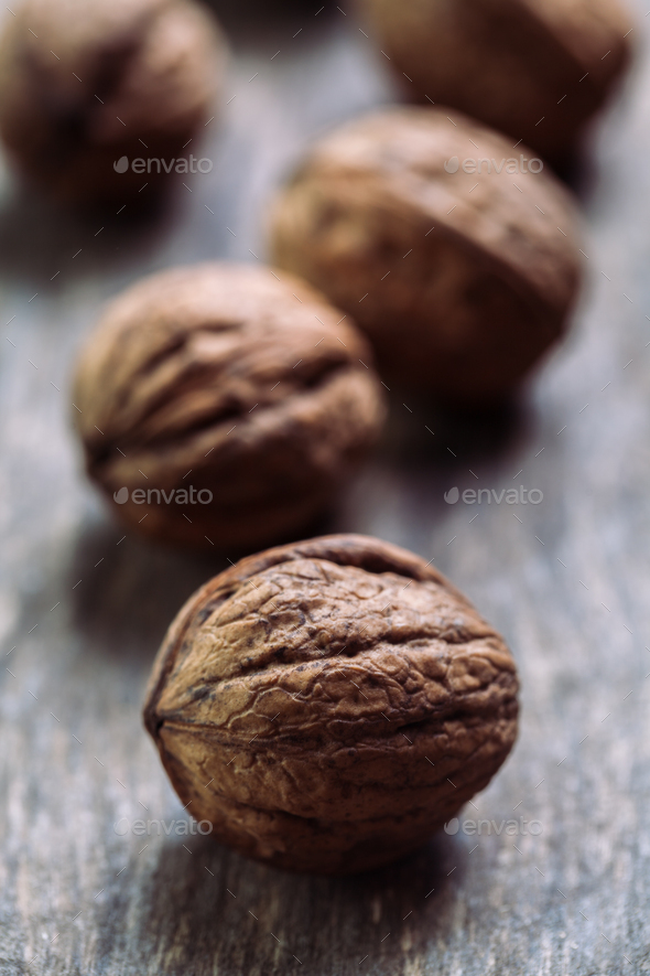 Walnuts with and without shells (filling the picture). Background of fresh walnuts - Stock Photo - Images