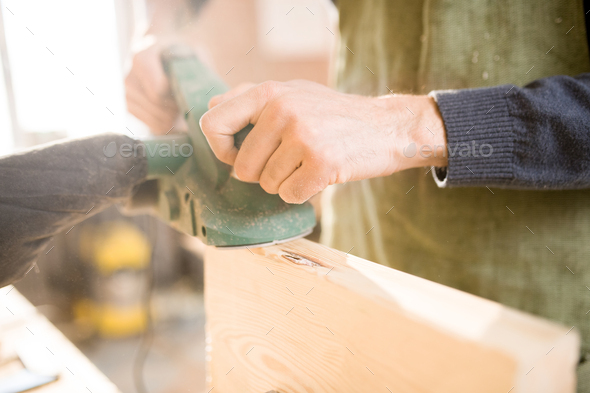 Handsome Carpenter Working in Sunlight - Stock Photo - Images