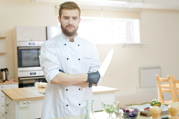 Handsome Professional Chef Posing in Kitchen - Stock Photo - Images