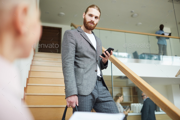 Succesfsul Businessman Going Downstairs - Stock Photo - Images