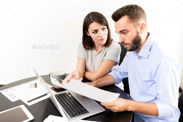 Preparing financial documents for mortgage - Stock Photo - Images