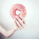 Hand holding a pink donut - PhotoDune Item for Sale