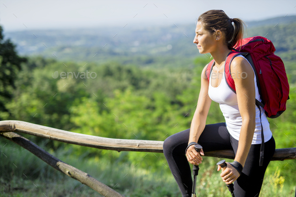 Beautiful hiker woman enjoying the view Stock Photo by ©nd3000