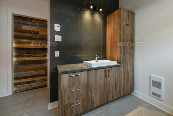 Modern bathroom with barn wood sink cabinets
