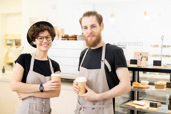 Baristas with takeout cups - Stock Photo - Images
