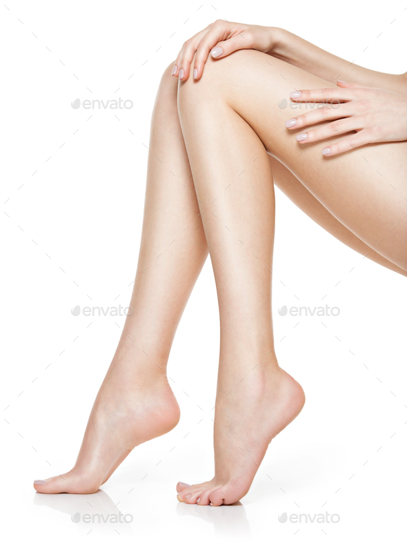 Beautiful women feet isolated on white. Close-up. - Stock Photo - Images