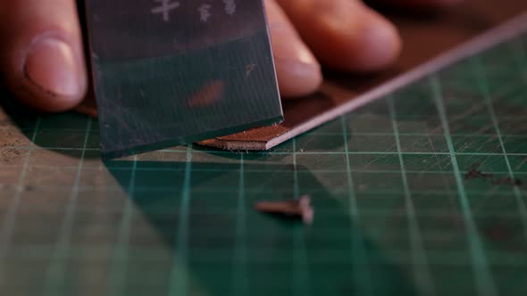 The Master Cut Off the Corners of the Workpiece From the Skin for a Travel Case. The Full Cycle of