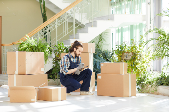 Busy moving manager responsible for inventory - Stock Photo - Images