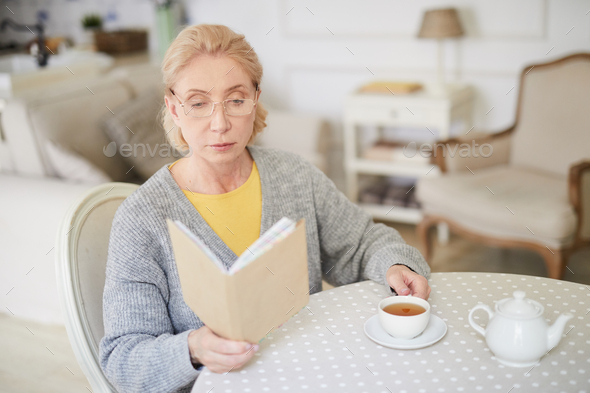 Reading at home - Stock Photo - Images