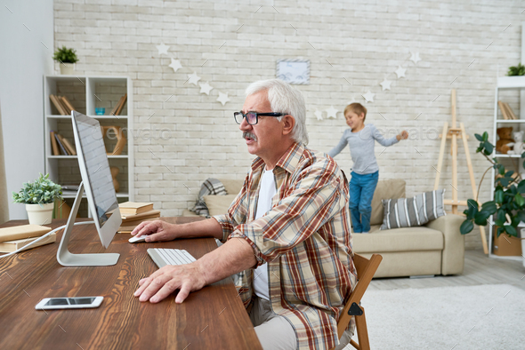 Grandpa Using Internet at Home