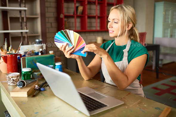 Creative Young Woman in Workshop - Stock Photo - Images