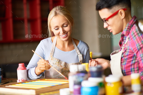 Young Women Working in Art Studio - Stock Photo - Images