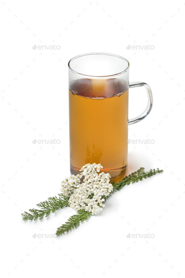 Fresh Common yarrow flowers and a cup of tea