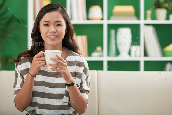 Pretty girl drinking coffee - Stock Photo - Images