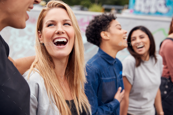Group Of Female Friends Posing For Selfie On Mobile Phone In Urban Skate Park - Stock Photo - Images