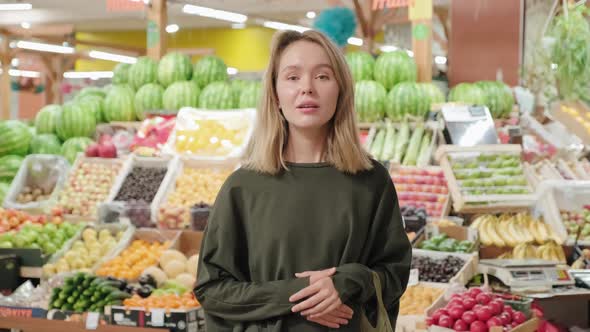 Portrait of Woman Posing at Market alt