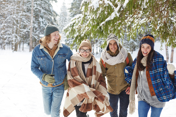 Happy Young People in Winter Resort - Stock Photo - Images