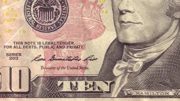 10 USD close-up motion. Ten cash american dollars macro view background