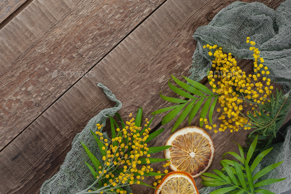 Old wooden table with mimosa flowers and leaves. Background imag - Stock Photo - Images