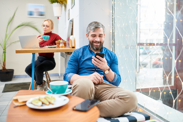 Man with smartphone - Stock Photo - Images