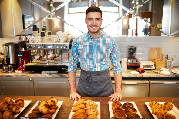 Guy with pastry - Stock Photo - Images