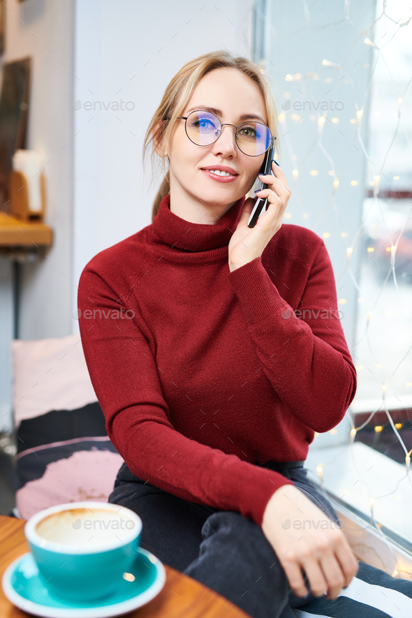 Phoning in cafe - Stock Photo - Images