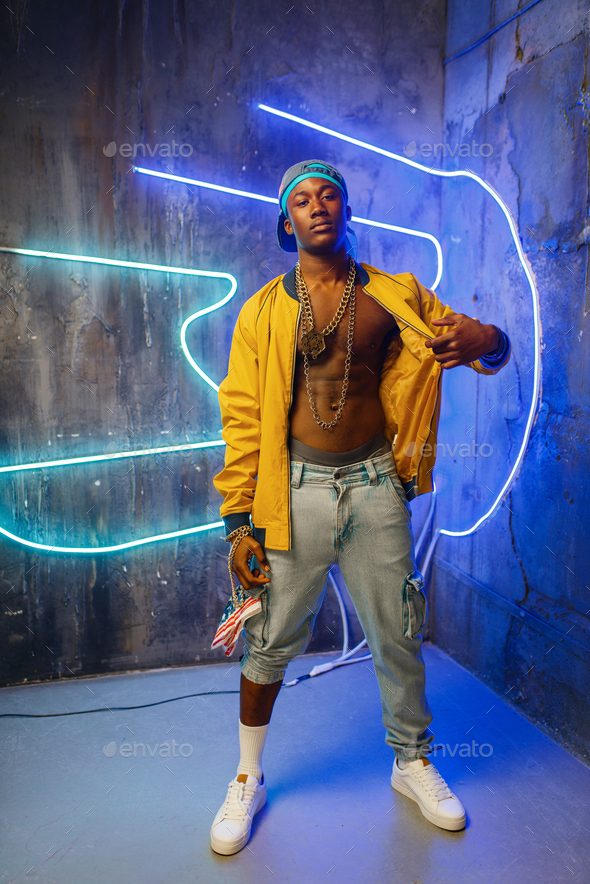 Black rapper underpass neon light on background Stock Photo NomadSoul1