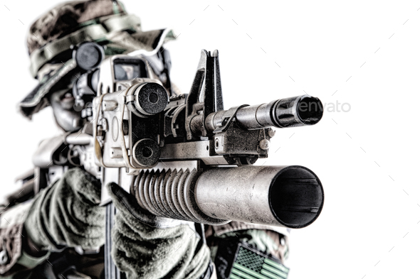 Aiming commando shooter isolated studio portrait - Stock Photo - Images