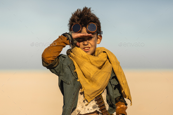 A post apocalyptic boy outdoors in desert