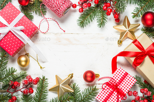 Christmas background with fir tree, present box and decorations - Stock Photo - Images