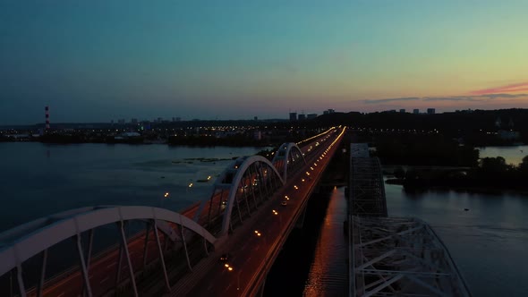 Aerial View of a City River Bridge in the Night alt