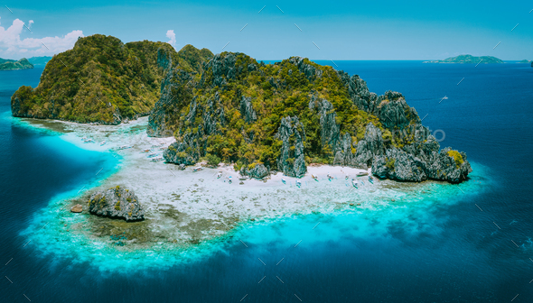 Aerial drone view of tropical Shimizu Island and pristine beach in blue ocean El Nido, Palawan - Stock Photo - Images