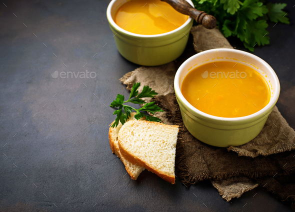 Bowls of hot vegetarian red lentil soup - Stock Photo - Images