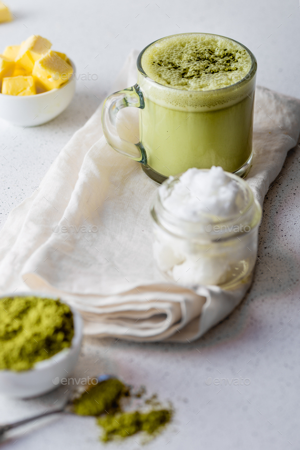 Ketogenic keto diet hot drink. Tea matcha blended with coconut oil and butter. - Stock Photo - Images