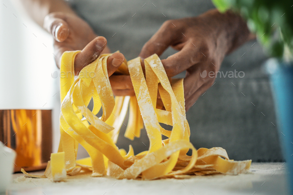 Pasta chef makes fresh italian pasta - Stock Photo - Images