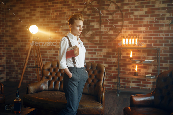 Woman in shirt and trousers with suspenders, retro