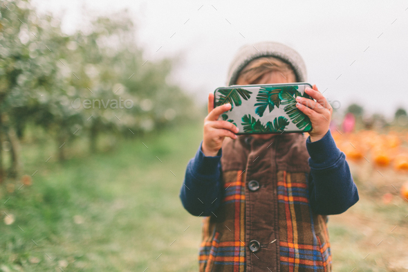 Little Boy Taking a Photo - Stock Photo - Images