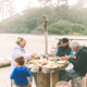 A Family Eating Dinner on the Beach - PhotoDune Item for Sale